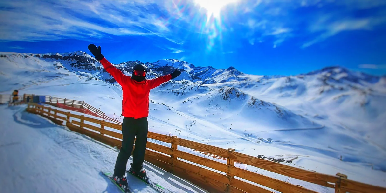 Hernan Caceres on skis in a snowy mountain landscape